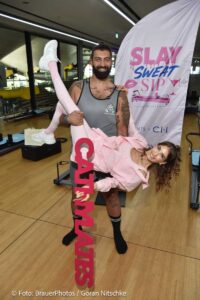 Cathy Hummels, Faisal Kawusi beim Event Cathylates Reformer Pilates - Cathy Hummels präsentiert ihre neue Lifestyle Marke im Restaurant Coubertin im Olympiapark in München am 22.08.2026 / Foto: BrauerPhotos / G. Nitschke