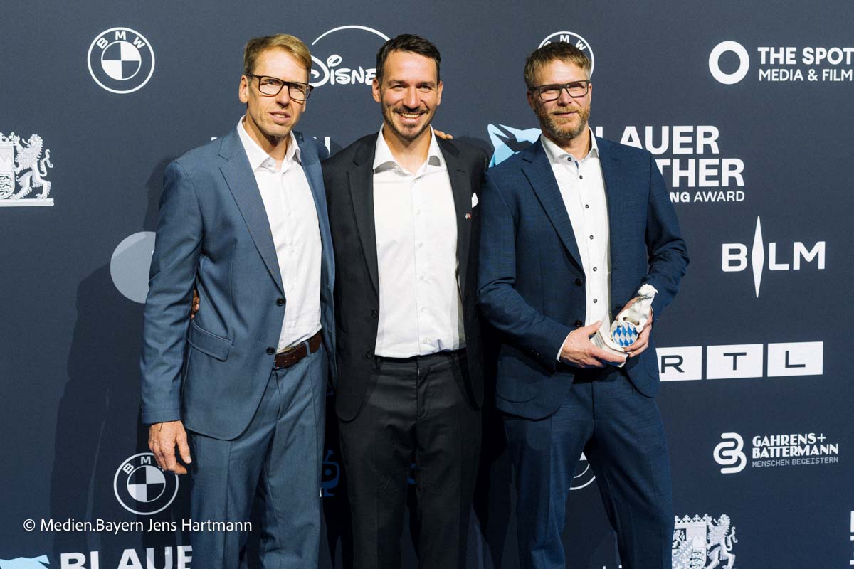 Franz Hinterbrandner, Max Reichel und Felix Neureuther. Blauer Panther - TV Streaming Award 2026, BMW Welt, am 21.10.206 Foto: Jens Hartmann für Medien.Bayern GmbH